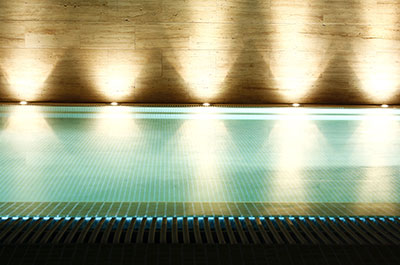 Exterior lighting around a swimming pool