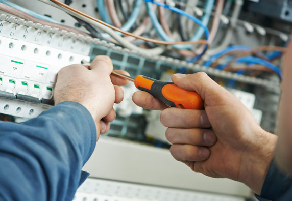 Commercial electrician troubleshooting building