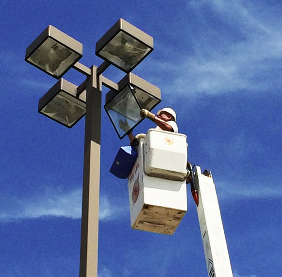 Commercial installation of pole lighting in a parking lot