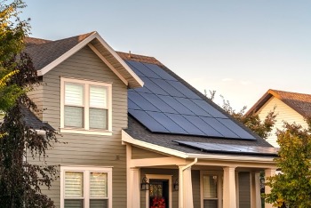 Large solar array covers entire roof of home